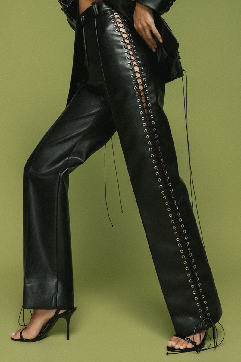 Matters Rogue trousers in black, stylish men's pants with a tailored fit, shown on a model.