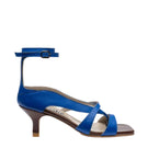 Blue asymmetric crossover heels by Gvasalia, featuring a stylish design and heel height perfect for fashionable occasions.