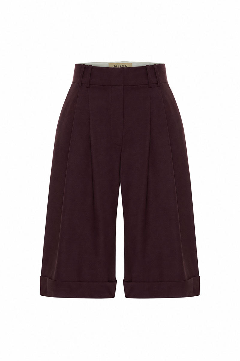 Acaria Studio red wine shorts with a relaxed fit, displayed on a mannequin, showcasing the stylish design and comfortable fabric.