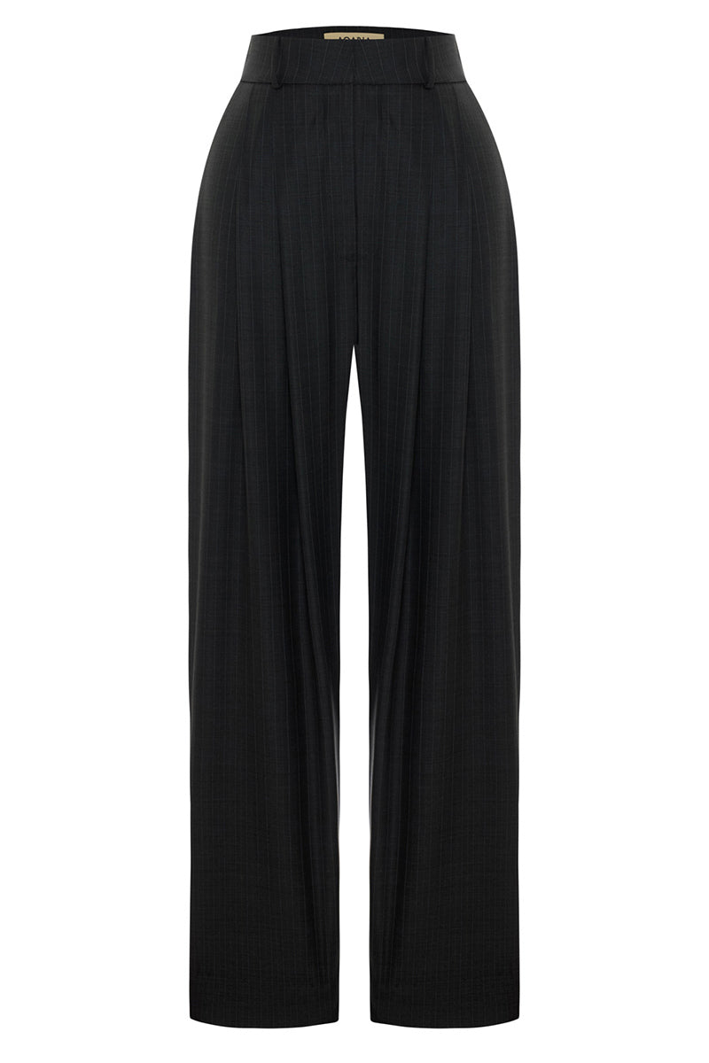 Acaria Studio Jasmin Pants in dark gray with subtle gray stripes, relaxed fit, and comfortable fabric, shown laid flat.