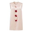 Pink Bloom Silk Sleeveless Dress by Not Just Pajama, shown as a stylish mini dress with a fitted silhouette and elegant design.