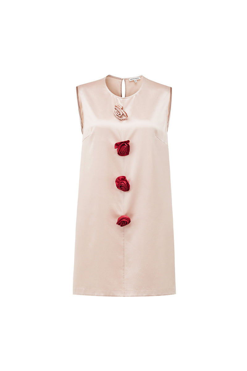 Pink Bloom Silk Sleeveless Dress by Not Just Pajama, shown as a stylish mini dress with a fitted silhouette and elegant design.