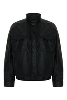 Acaria Studio Zoe leather bomber jacket displayed on a hanger, featuring a sleek black leather design with ribbed cuffs and collar.