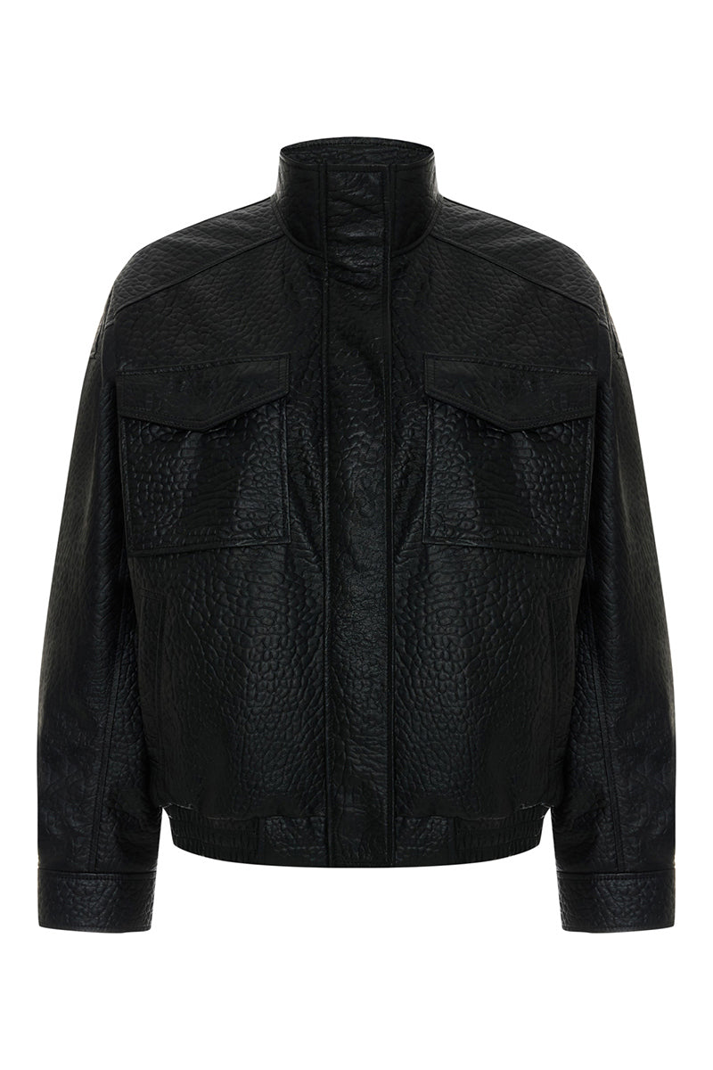 Acaria Studio Zoe leather bomber jacket displayed on a hanger, featuring a sleek black leather design with ribbed cuffs and collar.