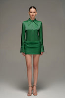 Dark green satin co-ord set featuring a stylish shirt and matching skirt from I.H.F Studio. Elegant and sleek for modern fashion.