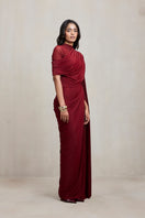 Deme By Gabriella Dianna Burgundy gown featuring elegant fabric and flowing design, perfect for formal occasions.