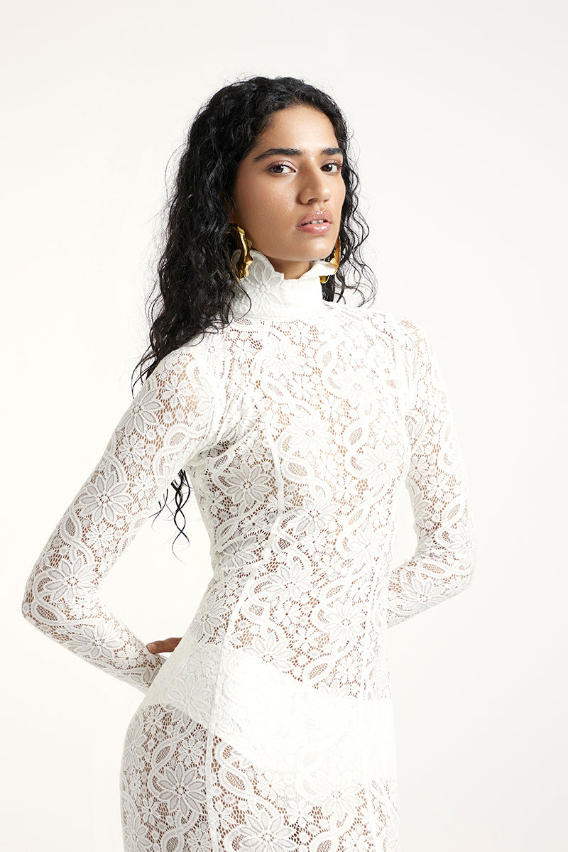 Deme By Gabriella amber maxi dress in off-white with flowing fabric and elegant design, perfect for summer or special occasions.