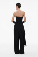 Black wide-leg wool trousers by ELENAREVA, tailored pants with a relaxed fit and sleek design, shown on a model.