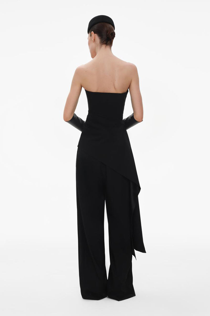 Black wide-leg wool trousers by ELENAREVA, tailored pants with a relaxed fit and sleek design, shown on a model.