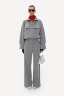 Gray straight-leg wool pinstripe trousers by ELENAREVA, shown folded with waistband and tailored fit visible in the image.