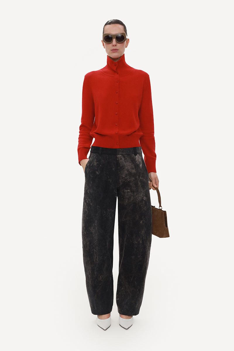 Leather Barrel-Leg Jeans by ELENAREVA featuring a sleek black design with classic denim texture and barrel-style leg fit.