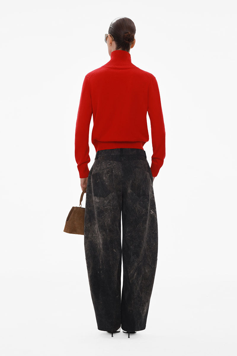 Black barrel-leg jeans by ELENAREVA with a relaxed fit, displayed on a hanger against a neutral background.