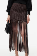 Hand-braided fringe brown midi skirt by Kris Marán, featuring detailed craftsmanship and flowing design.