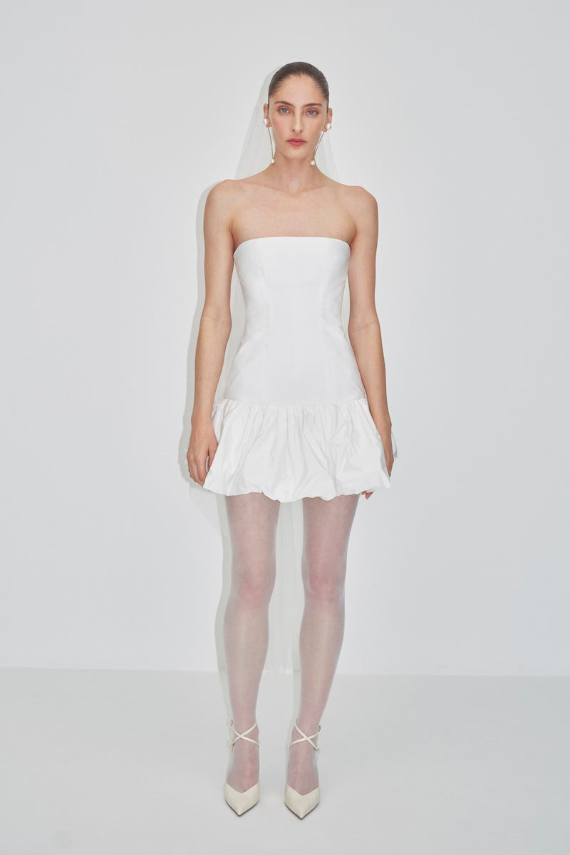 Bridal short veil by JC Pajares, delicate white hair accessory with lace trim for wedding or special occasion attire.