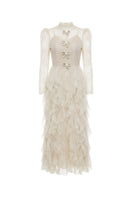 White Plan blush feather romance gown with flowing fabric and delicate feather details, perfect for elegant occasions.