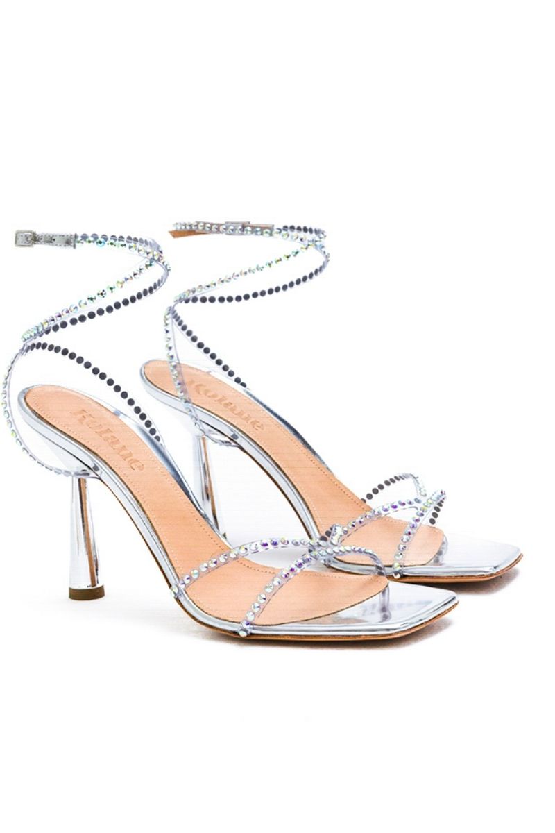 Silver crystal Kolane Kim sandal with transparent straps and open toe design, featuring elegant crystal embellishments.