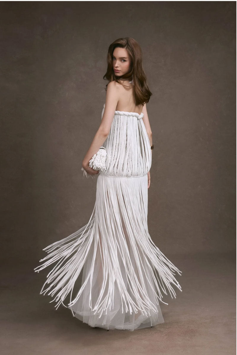 KEIRA TONG fringe lace maxi dress featuring a fitted corset bodice and flowing skirt with intricate lace details.
