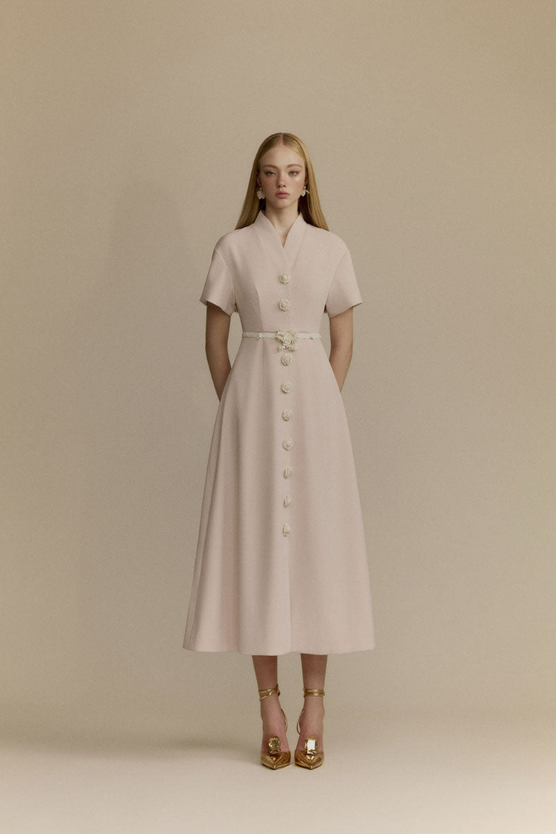 White Plan Rosalie Midi Dress featuring a flowy fabric, sleeveless design, and elegant silhouette perfect for summer wear.