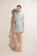 Valenciani cropped mint jacket with long sleeves and button front, stylish outerwear for casual or trendy outfits.