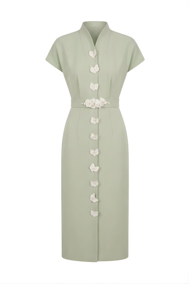 White Plan Liora tailored midi dress with a fitted bodice and flowing skirt, showcased on a neutral background.