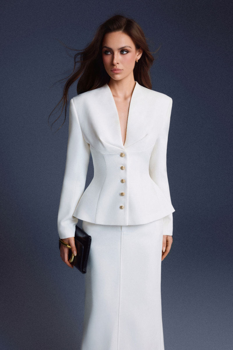 White waistband midi skirt by Keira Tong, shown on a model with flowing fabric and a high waist design.