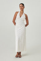 Off-white Turin maxi dress by Summer Away featuring a flowing silhouette and elegant design, shown on a model.