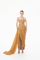 Elegant chartreuse gold heart-embellished draped gown by Happy Clothing, featuring flowing fabric and intricate design details.