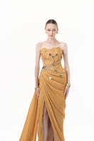 Elegant chartreuse gold gown by Happy Clothing featuring heart embellishments and draped design, showcased in a full-length image.