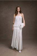 Keira Tong fringe lace corset maxi dress with flowing fabric and intricate lace details, perfect for elegant evening wear.