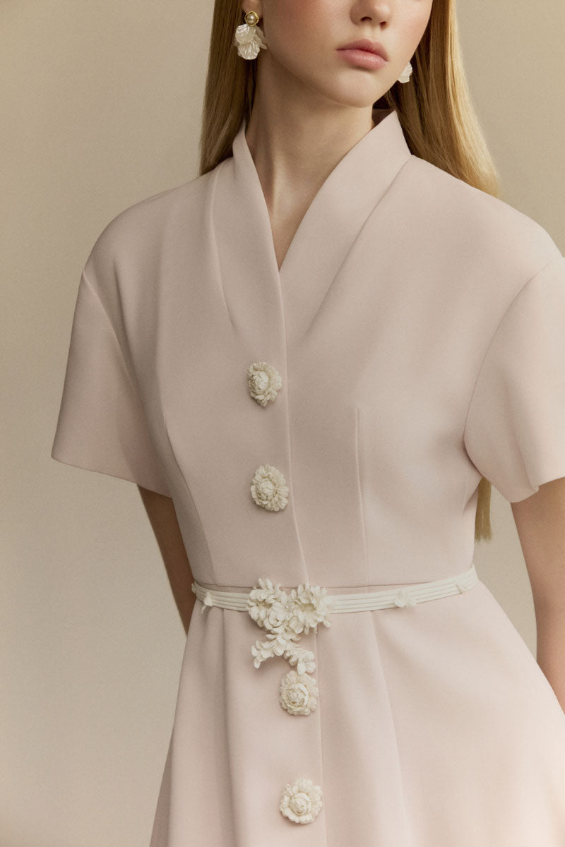 White Plan Rosalie midi dress featuring a flowy fabric, V-neckline, and sleeveless design perfect for elegant summer occasions.