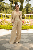Estefania LOVE pants in sand color, stylish casual pants with a relaxed fit and waistband, front and side view.