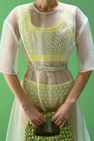 Lalo Thalia yellow shorts for women, casual summer shorts with elastic waistband and relaxed fit, front view.