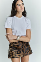 ZUT Tellier mini skirt in honey zebra print, featuring a stylish short skirt design with bold animal pattern.