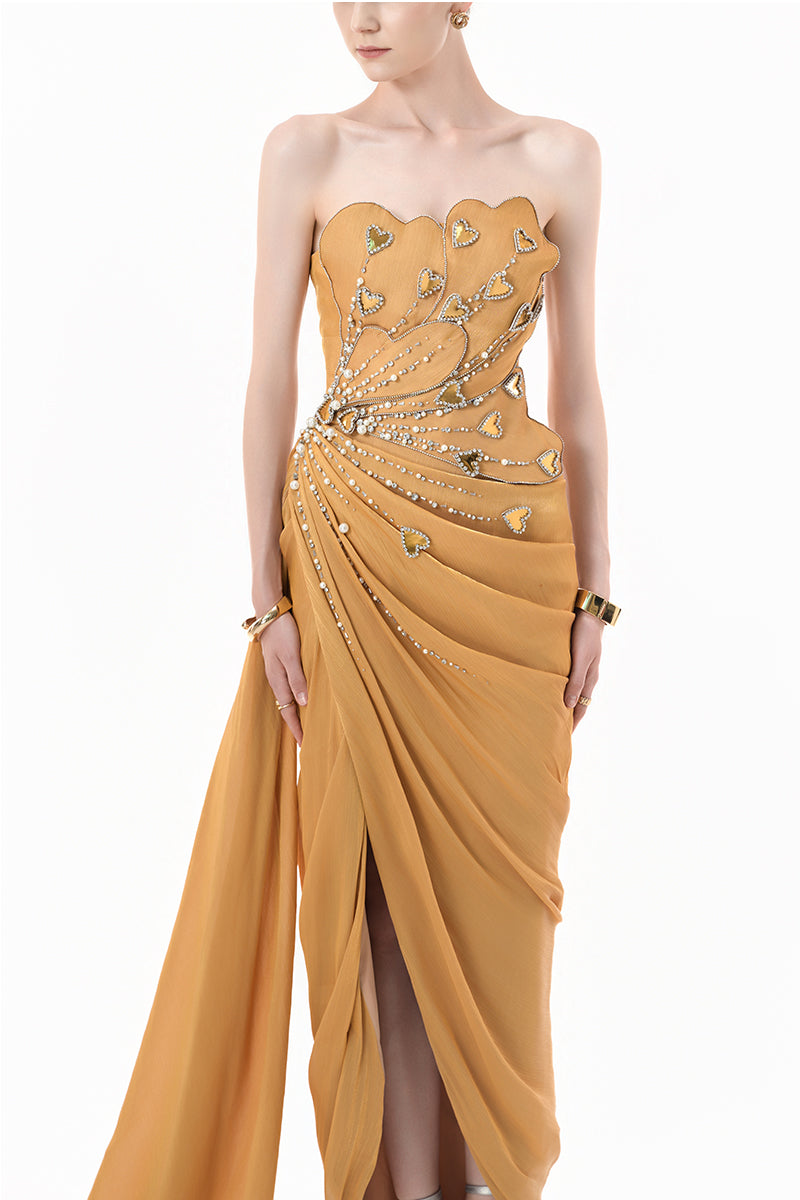 Elegant chartreuse gold heart-embellished draped gown by Happy Clothing, featuring flowing fabric and intricate heart details.