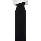 Elegant Margée Atelier Serene Off-Shoulder Gown with flowing fabric and delicate detailing, styled for formal occasions.