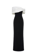 Elegant Margée Atelier Serene Off-Shoulder Gown with flowing fabric and delicate detailing, styled for formal occasions.