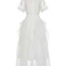 White Plan Ivory Whisper Layer Dress gown with flowing layers and elegant design, perfect for formal occasions.