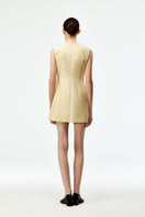 Cream cotton mini dress by Chictopia, featuring a fitted bodice and flowy skirt, perfect for casual or summer wear.