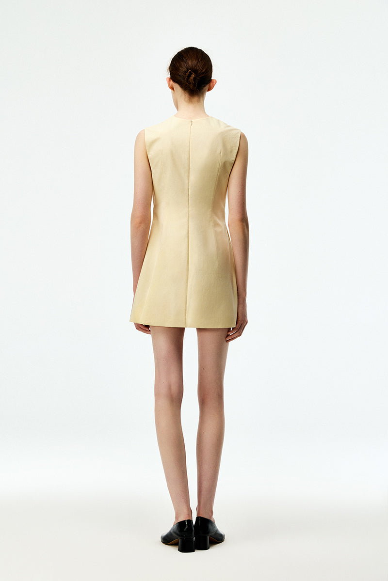 Cream cotton mini dress by Chictopia, featuring a fitted bodice and flowy skirt, perfect for casual or summer wear.