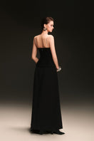 Beaded tube top by Keira Tong featuring intricate beadwork and a fitted design, displayed on a neutral background.