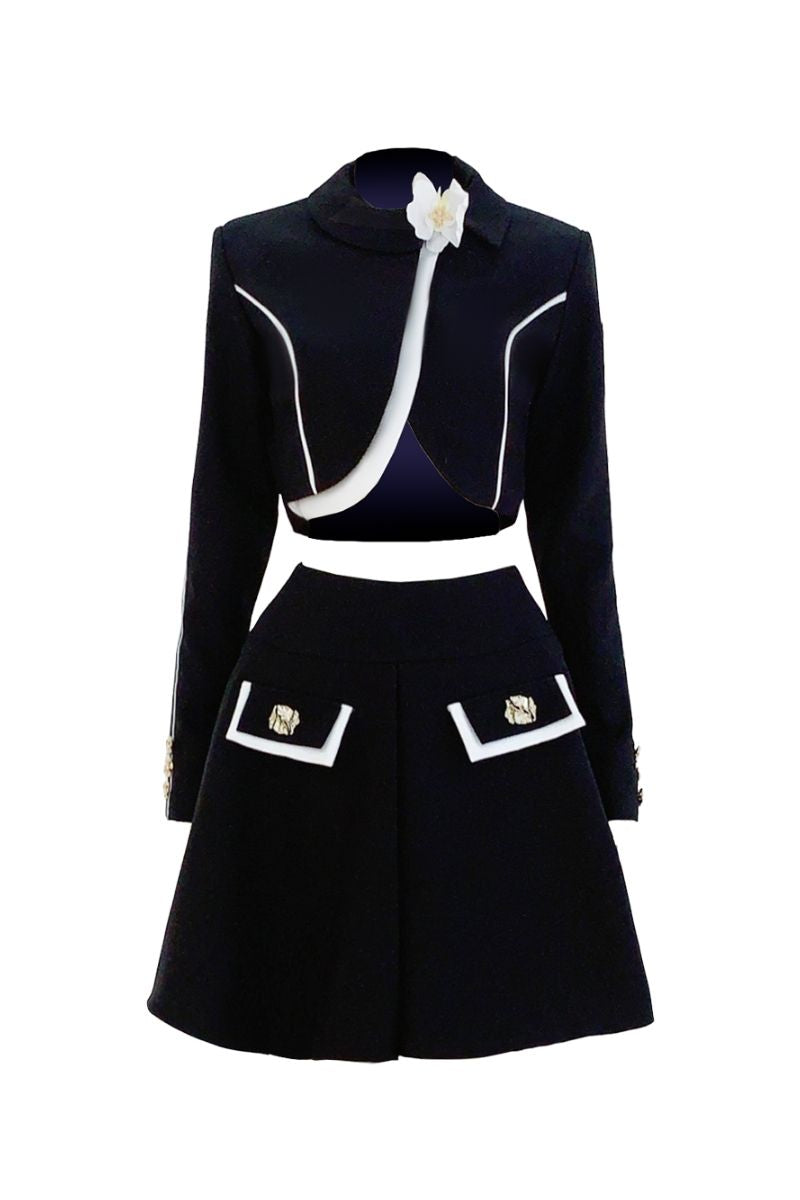 Do Long black vest-shaped crop top and A-line skirt co-ordinates set, stylish and fitted for a modern, chic look.