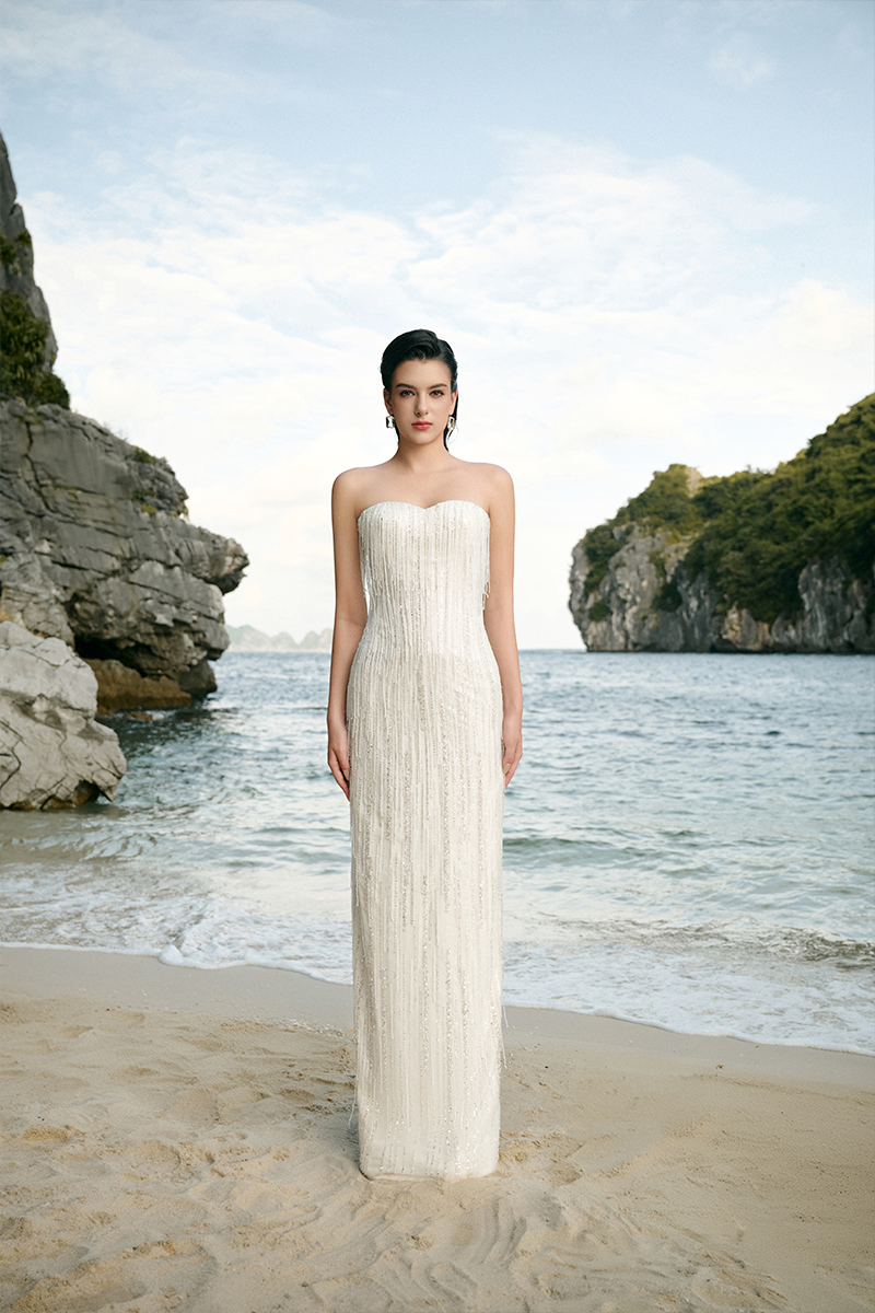 Strapless semi-heart gown by Tracy Studio featuring elegant design, fitted bodice, and flowing skirt for formal occasions.