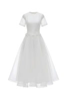 White Plan Elina Tulle Dress gown with flowing fabric and delicate detailing, perfect for elegant occasions.