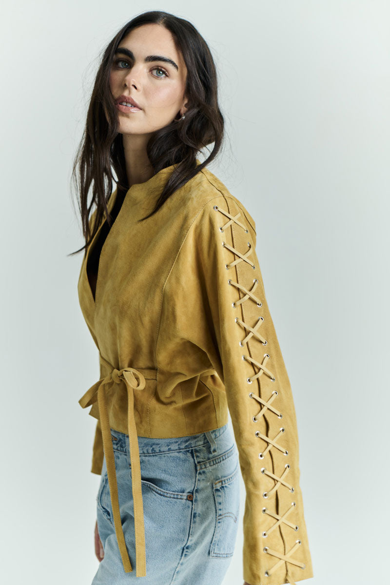 ZUT mango jockey jacket featuring a stylish design with a zip-up front and fitted silhouette, displayed on a hanger.