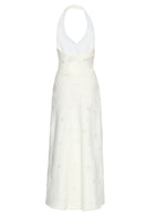 Off-white Turin maxi dress by Summer Away, flowing fabric and elegant design, displayed on a hanger against a neutral background.