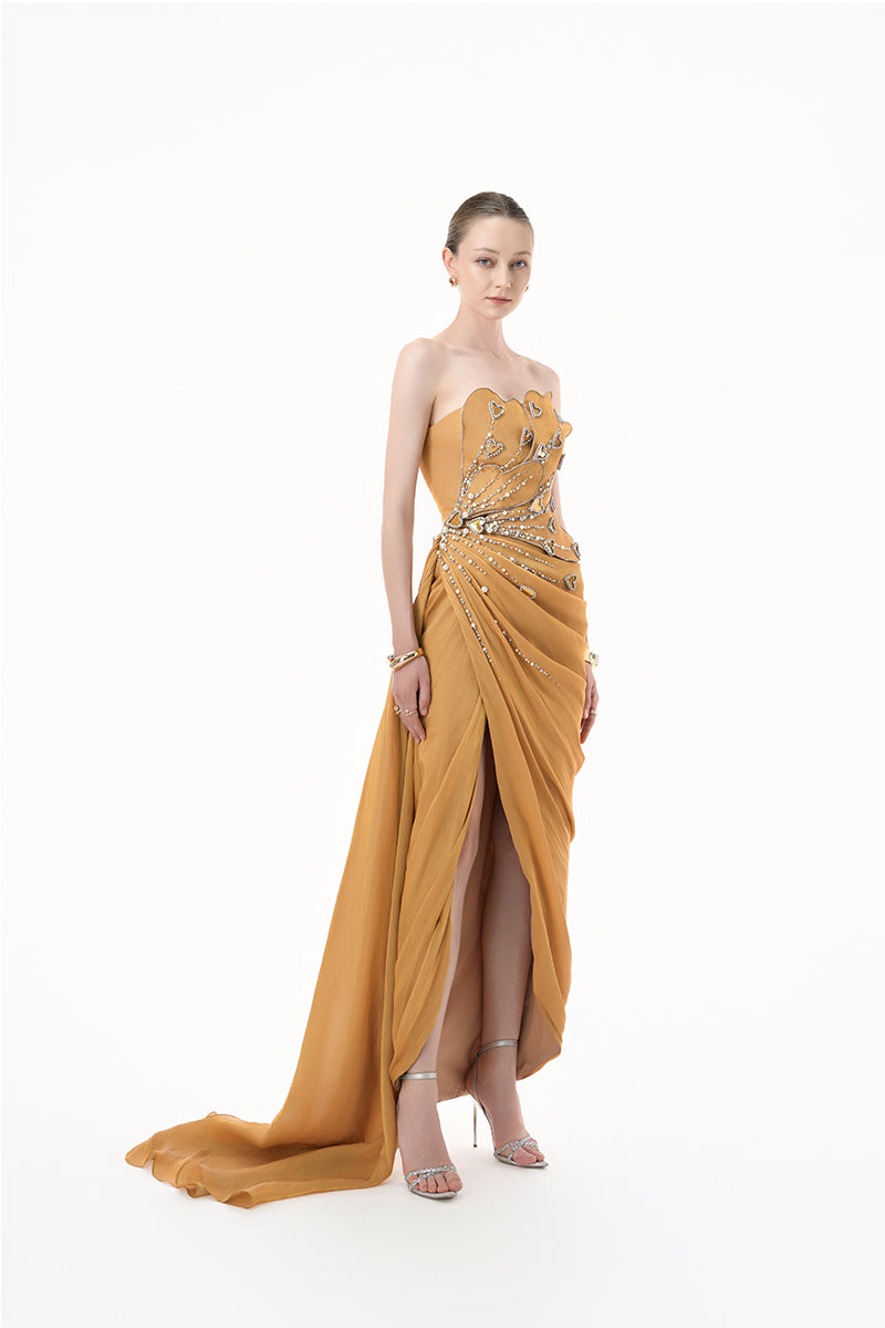 Elegant chartreuse gold heart-embellished draped gown by Happy Clothing featuring flowing fabric and intricate detailing.