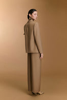 Arti Apparel CECI Pants in neutral fabric, showing relaxed fit and stylish design on a model.