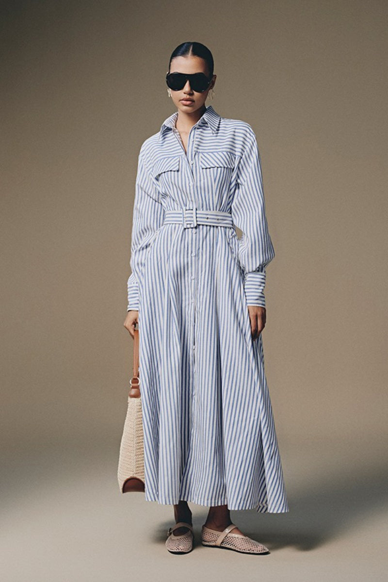 Keira Tong Thera Stripped Shirt Dress, a stylish maxi dress with vertical stripes and a relaxed fit, shown on a model.