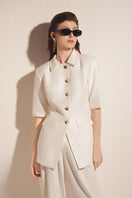 White short sleeve blazer from Valenciani, stylish jacket with a tailored fit, perfect for smart casual or office wear.