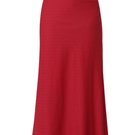 Summer Away Cefalù maxi skirt in cherry with flowing fabric and vibrant color, styled as a casual and elegant summer outfit.